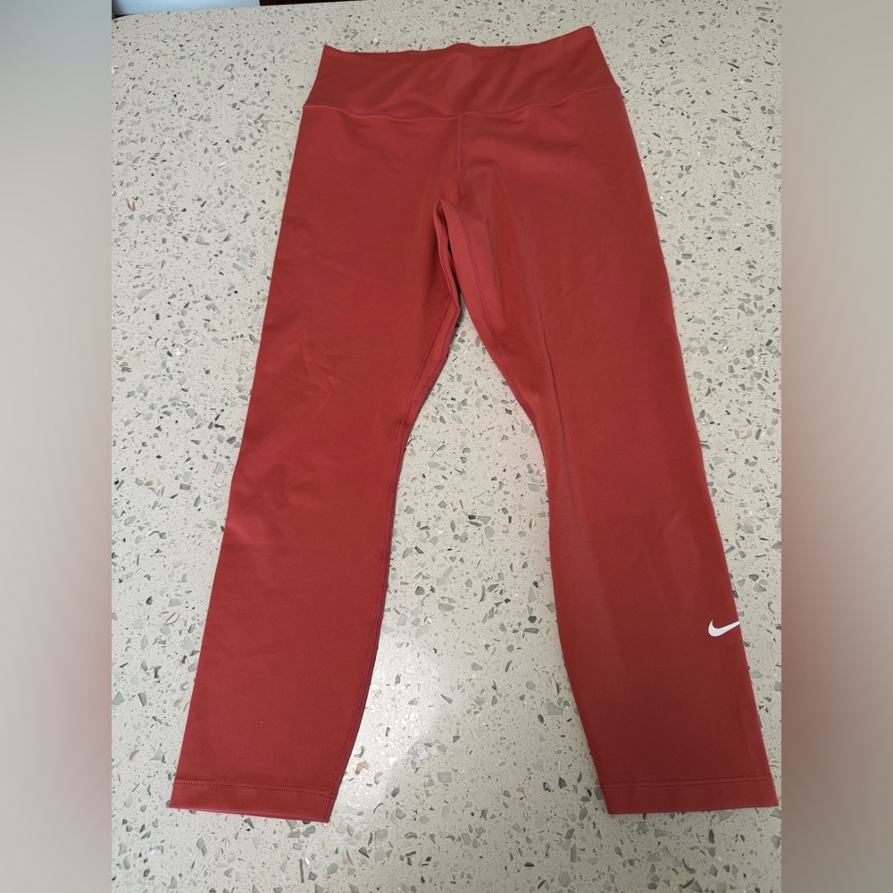 Nike Women’s Dri-Fit Leggings Size Small Orange or Coral color